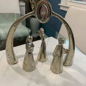 Elegant Silver Nativity Scene with Arch